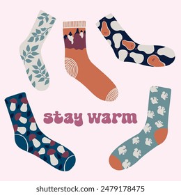 Set of textile socks with leaves, pears, mushrooms, squirrels, mountains and inscription Stay warm, vector, poster, postcard