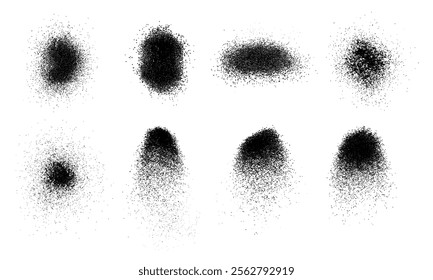 Set of textured grainy granulated brushes of black color of different shapes and sizes. Small spots of spray paint. Vector illustration on white isolated background.