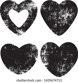 Set of textured vector valentine hearts. Decorative design elements. Distressed symbols of love. Textured Valentine's Day signs. Vector illustration. Black hearts isolated on white. EPS10.