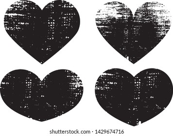 Set of textured vector valentine hearts. Decorative design elements. Distressed symbols of love. Textured Valentine's Day signs. Vector illustration. Black hearts isolated on white. EPS10.