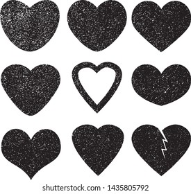 Set of textured vector valentine hearts. Decorative design elements. Distressed symbols of love. Textured Valentine's Day signs. Vector illustration. Black hearts isolated on white. EPS10.