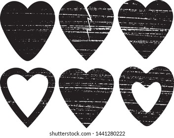 Set of textured vector valentine hearts. Decorative design elements. Distressed symbols of love. Textured Valentine's Day signs. Vector illustration. Black hearts isolated on white. EPS10.