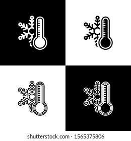 Set Thermometer with snowflake icon isolated on black and white background.  Vector Illustration