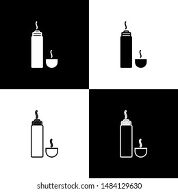 Set Thermos container icon isolated on black and white background. Thermo flask icon. Camping and hiking equipment.  Vector Illustration