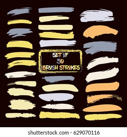 Set of thirty trendy yellow, ochre, and grey vector brush strokes or backgrounds. Hand painted ink brush strokes, brushes, and lines. Dirty grunge artistic design elements. Text backgrounds. svg