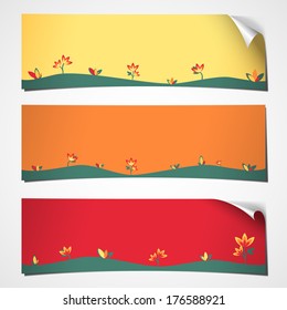 set of three banners with curled corner colored for spring with flower decor