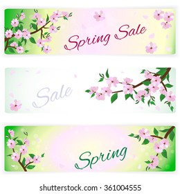 set of three banners with spring flowering branches of trees