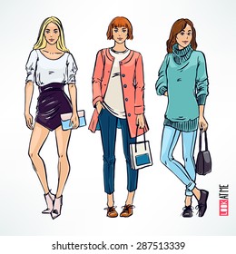 Set with three beautiful fashion modern girl. hand-drawn illustration