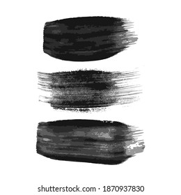 Set of three black brush strokes. Hand drawn ink spots isolated on white background. Vector illustration
