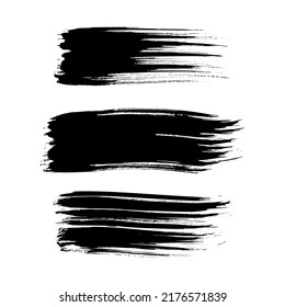 Set of three black brush strokes. Hand drawn ink spots isolated on white background. Vector illustration