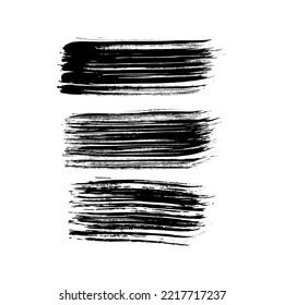 Set of three black brush strokes. Hand drawn ink spots isolated on white background. Vector illustration