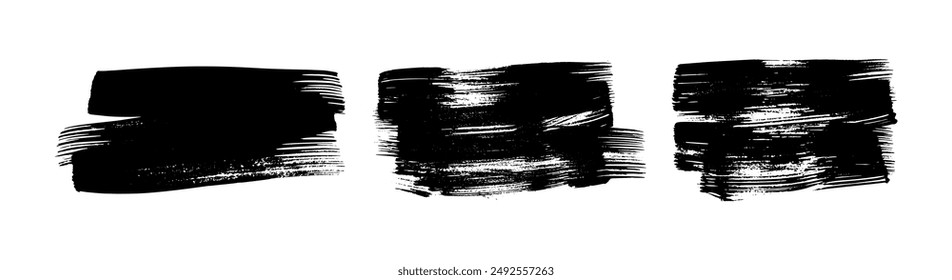 Set of three black brush strokes. Hand drawn ink spots isolated on white background. Vector illustration