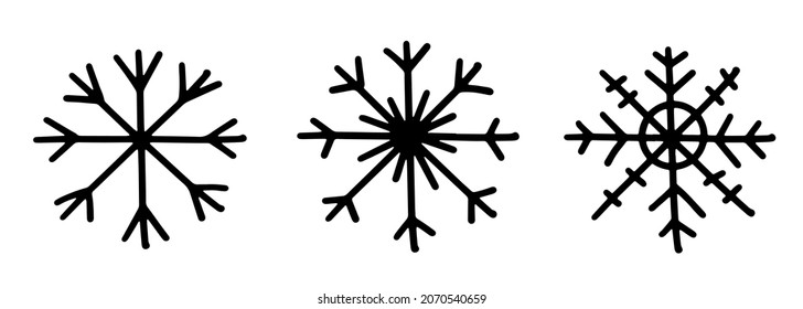 Un conjunto de tres íconos negros de copos de nieve de diferentes manos. Ilustración vectorial aislada en el fondo.