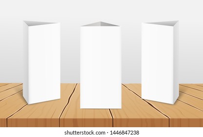 Set Of Three Blank Vertical Table Tent Cards To Presentate Your Design From All Sides 3d Realistic Vector Mockup On The Wooden Surface. Restaurant Folded Paper Label.