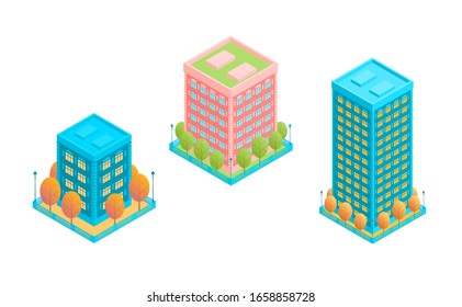 Set of three buildings in isometric style. Residential high houses with a fence and trees. Vector isolated illustration in isometric style.
