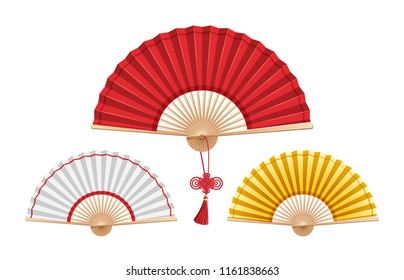 Set of three Chinese fans isolated on white background. Large red fan with a wishes knot in the center. Small white and gold on the sides.