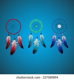 Set of three dream catchers different colors on blue background