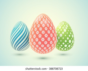 Set of three Eggs with different beautiful patterns on shiny background for Happy Easter celebration.