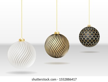 Set of three evening balls. Gold, silver, black symbol.
