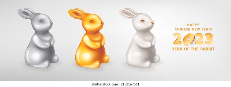 Set of three figurines of Rabbits different colors. White ceramic, silver and golden metal. Rabbit is a symbol of the 2023 Chinese New Year. Vector illustration of decorative zodiac sign of rabbit