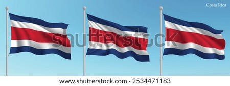 Set of three flags of Costa Rica waving on flagpoles with a vibrant blue sky backdrop.