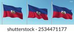 Set of three flags of Haiti waving on flagpoles with a vibrant blue sky backdrop.