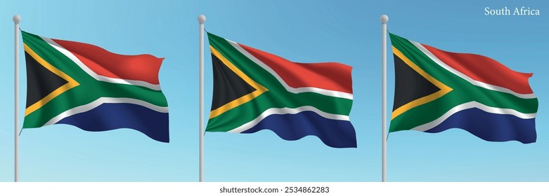 Set of three flags of South Africa waving on flagpoles with a vibrant blue sky backdrop.