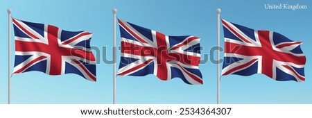 Set of three flags of United Kingdom waving on flagpoles with a vibrant blue sky backdrop.