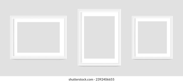  Set of three frames photo picture frames on wall, vector white mockups or empty posters. Empty photo frames mockups for pictures or photograph, realistic 3D blank templates