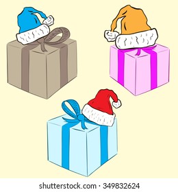 Set with three gift packings in Christmas caps