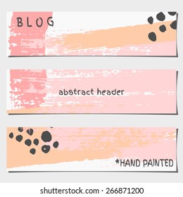 A set of three hand drawn brush strokes header designs. Pastel pink, black and orange color palette. Modern and elegant blog design elements.