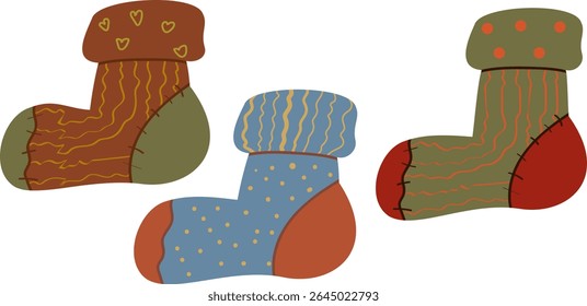 Set of three isolated cartoon warm and cozy socks with various patterns in autumn colors. Ideal for fall, winter, holiday stationery and home comfort designs. 