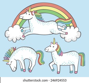 A set of three quirky cartoon unicorns with rainbow manes and tails.