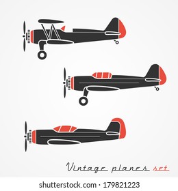 Set of three retro planes - gray silhouettes on white background