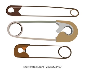 Set of three safety pins in various sizes on white background
