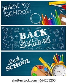 Set of three School supplies on blackboard background