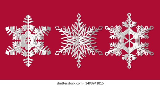 Set of three snowflakes on a red background. Winter patterns. Flakes of snow. Vector illustration in paper cut style.