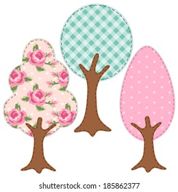 Set of three trees as retro textile applique of various fabrics in shabby chic style