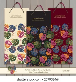 Set of three Tropical pattern Wine Gift Bags on wood. Red, white & any wine or spirit present bag design. Place for your text. Vector Editable. Exotic Tropical pattern is masked. Tropical Leafs icon 