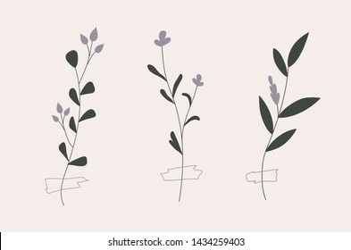 Set of three twigs with purple flowers pinned with a tape.