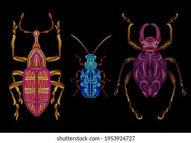 A set of three violet different embroidered beetles. Decorative element for embroidery, patches, stickers, badges, print for t-shirts.