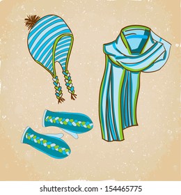 Set of three warm knitted hat, scarf and gloves in blue color