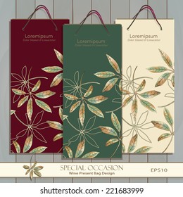 Set of three Wine Gift Bags on wood texture. Vector design template. Red, white & any wine or spirit present bag design. Original Autumn Leaf pattern is complete masked. Editable. Golden Leaf icon. 