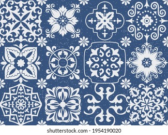 Set of tiles Azulejos on blue shabby background. Original traditional Portuguese, Spain decor. Seamless patchwork tile with Victorian motives. Ceramic tile in talavera style. Gaudi mosaic. Vector