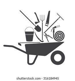 Set of tools for farmers farming. Tool in a wheelbarrow