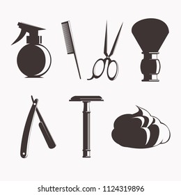 A set of tools for the hairdresser. Scissors, comb, shaving brush and razor. Monochrome image isolated on white background. Barbershop.