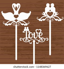 set of toppers with swans