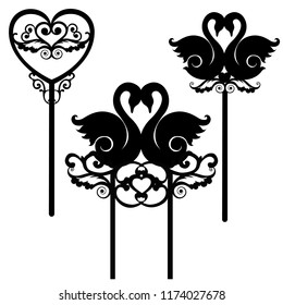 set of toppers with swans