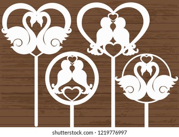 set of toppers with swans