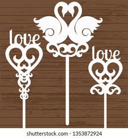 set of toppers with swans